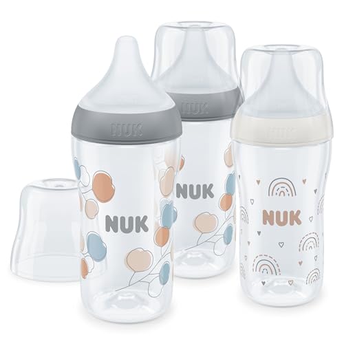 PROMOCIÓN: NUK Perfect Match Set de biberones | +3 meses | Se adapta al paladar | Control de temperatura | Ventilación anticólico | 260 ml | Sin BPA | Tetina de silicona mediana | Arcoíris y ita | 3 uds. con descuento